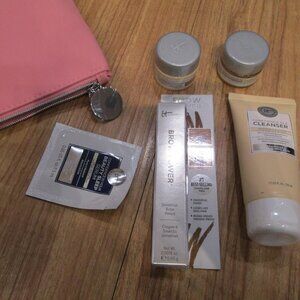 5 Piece It Cosmetics products with cute pink rubbery zipper bag